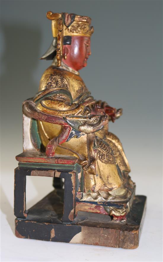 A Chinese gilt and polychrome wood figure of Xi Wangmu, 18th century, 22cm